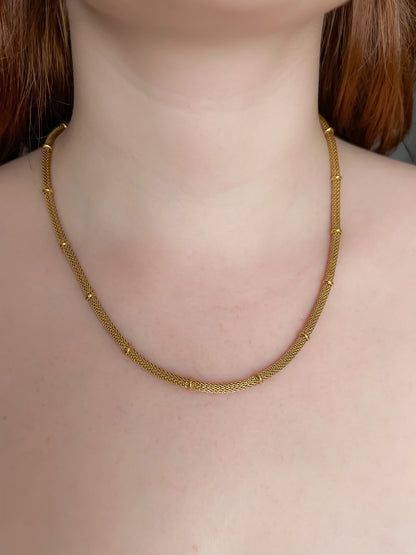 Collar cadena con bolitas doradas